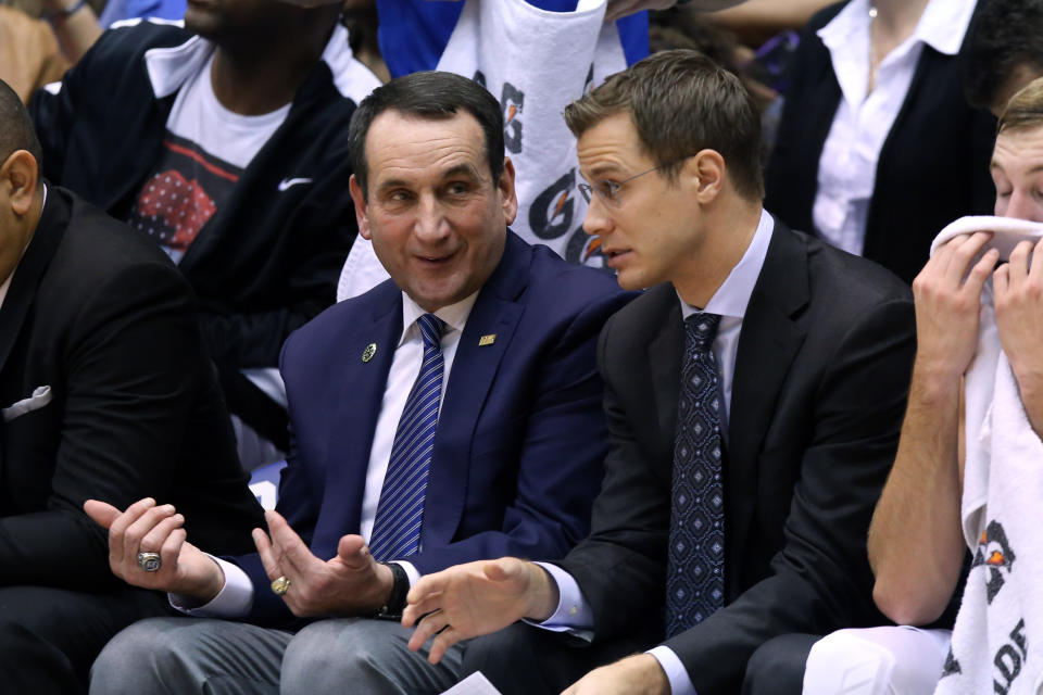 30 October 2015: Duke head coach Mike Krzyzewski (left) with assistant Jon Scheyer (right). The Duke University Blue Devils hosted the Florida Southern College Moccasins at Cameron Indoor Stadium in Durham, North Carolina in a 2015-16 NCAA Men's Basketball Exhibition game. Duke won the game 112-68. (Photograph by Andy Mead/YCJ/Icon Sportswire) (Photo by Andy Mead/YCJ/Icon Sportswire/Corbis/Icon Sportswire via Getty Images)