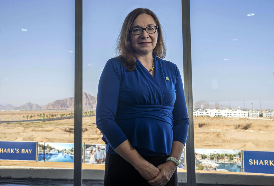 FILE - Katharine Hayhoe, Canadian atmospheric scientist, poses for a photograph, backdropped by mountains, at the COP27 U.N. Climate Summit, in Sharm el-Sheikh, Egypt, Nov. 12, 2022. (AP Photo/Nariman El-Mofty, File)