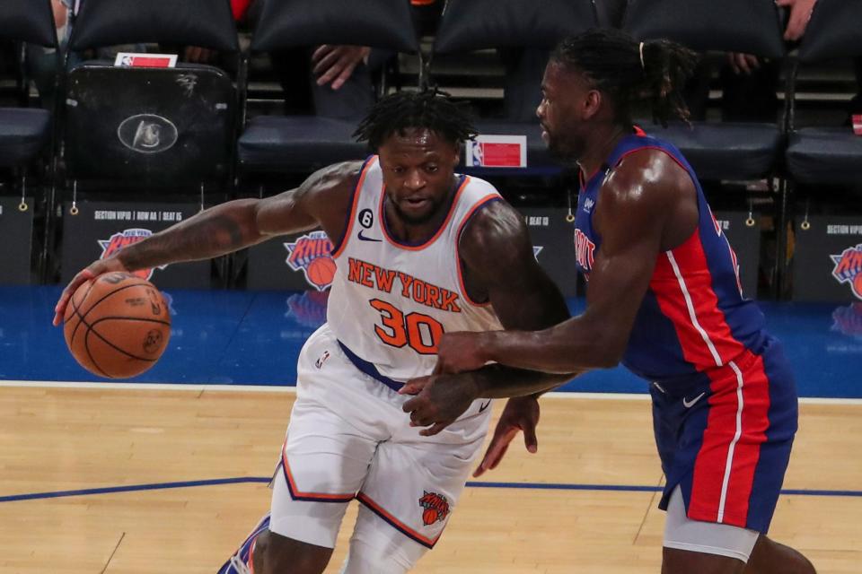 Knicks forward Julius Randle posts up against Pistons center Isaiah Stewart in the first quarter of the preseason game at Madison Square Garden on Tuesday, Oct. 4, 2022.
