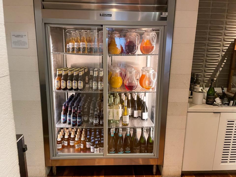 A drink fridge in the airport lounge.