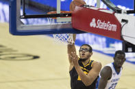 Kennesaw State's Alex Peterson scores against Creighton during the first half of an NCAA college basketball game in Omaha, Neb., Friday, Dec. 4, 2020. (AP Photo/Kayla Wolf)