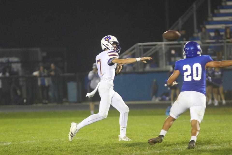 Nevada's Connor King throws a pass against Perry on Friday, Sept. 22, 2023, at Dewey Field in Perry.