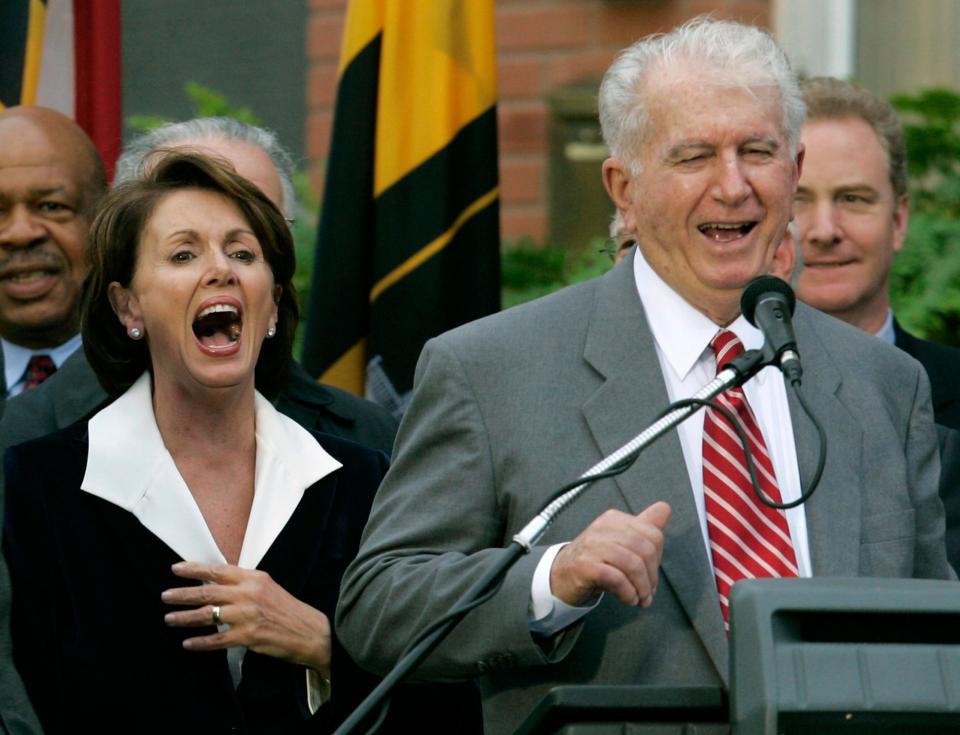 Speaker of the House Nancy Pelosi, D-Calif., left, laughs as her brother Thomas D' Alesandro III, right, makes a joke as he introduces her husband Paul, during a street renaming ceremony in her behalf, in Baltimore,  Jan. 5, 2007.