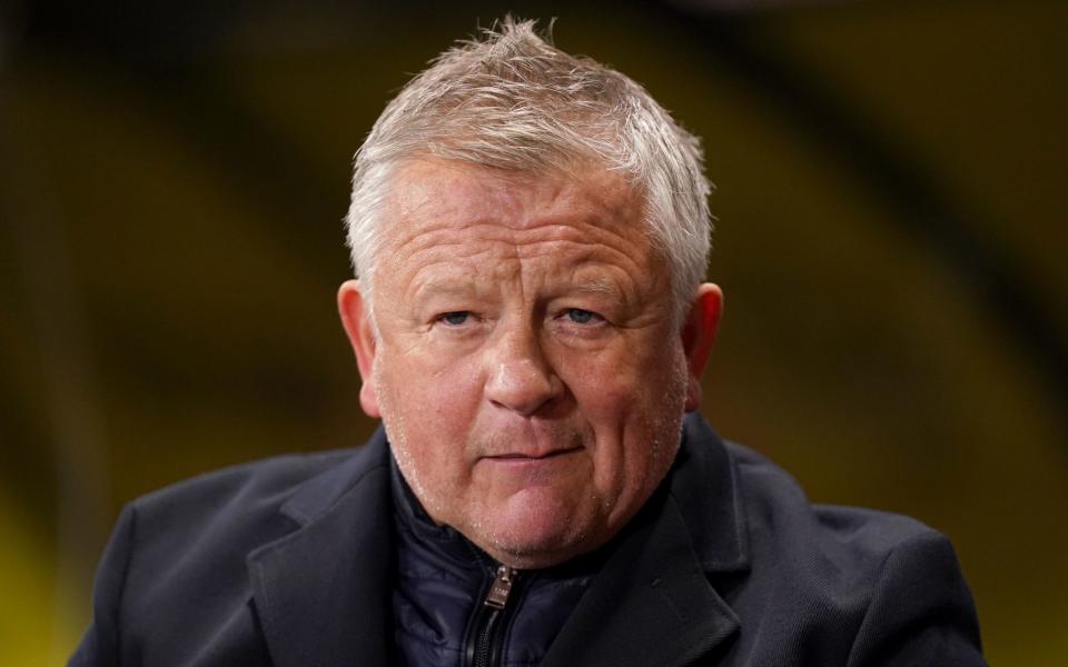 Chris Wilder looks on from the touchline during