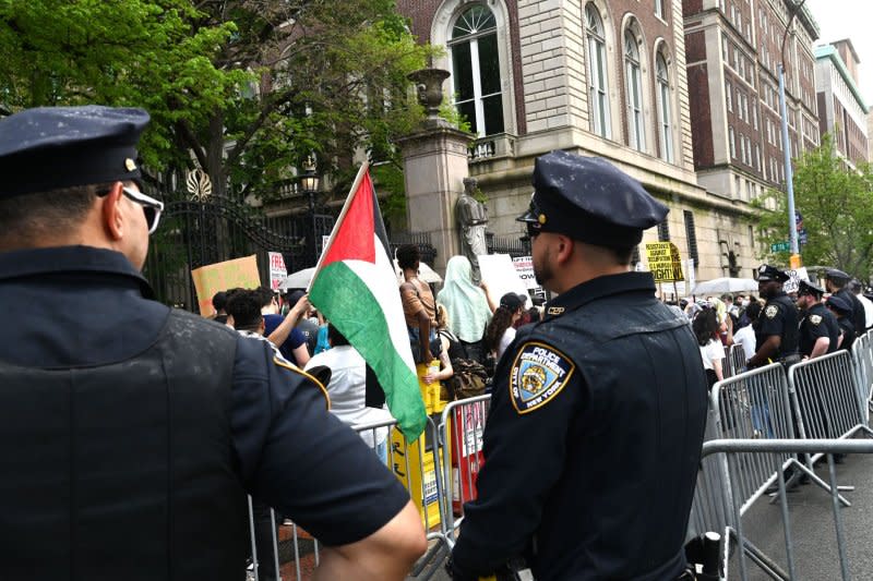 Pro-Palestine protesters gather in front of Columbia University in New York City on Monday, when protesters received notices from Columbia to vacate the encampments by the deadline or be suspended. Photo by Louis Lanzano/UPI