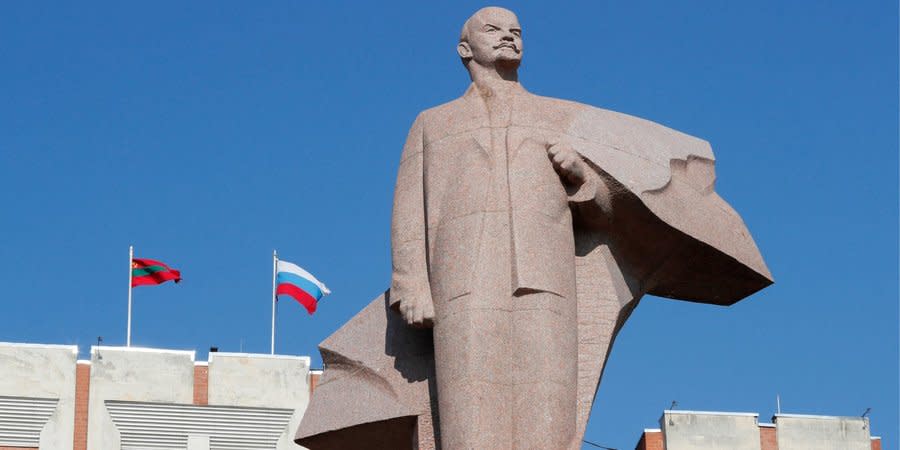 Statue of Vladimir Lenin in front of the 