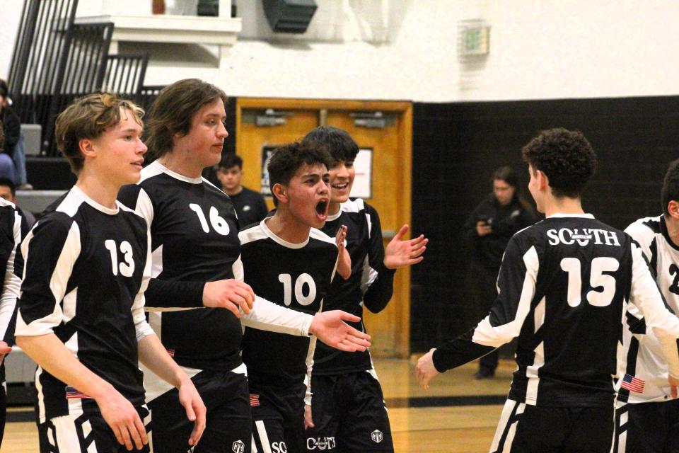 Pueblo South Colts Jackson Leyh, Brody Dunlap, Eryc Heredia, Luke Vazquez, and Dathan Montera celebrate during a timeout after scoring a point against Cheyenne Mountain at Pueblo South High School on Tuesday, Mar 5, 2024.