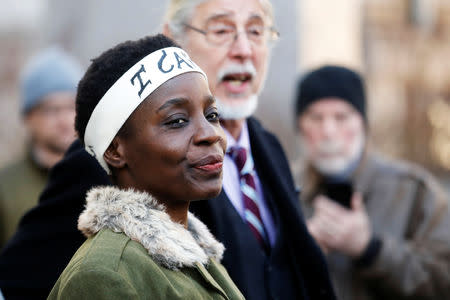 FILE PHOTO: Therese Patricia Okoumou speaks to the media after her sentencing for conviction on attempted scaling of the Statue of Liberty to protest the U.S. immigration policy, outside a federal court in New York, U.S., March 19, 2019. REUTERS/Shannon Stapleton