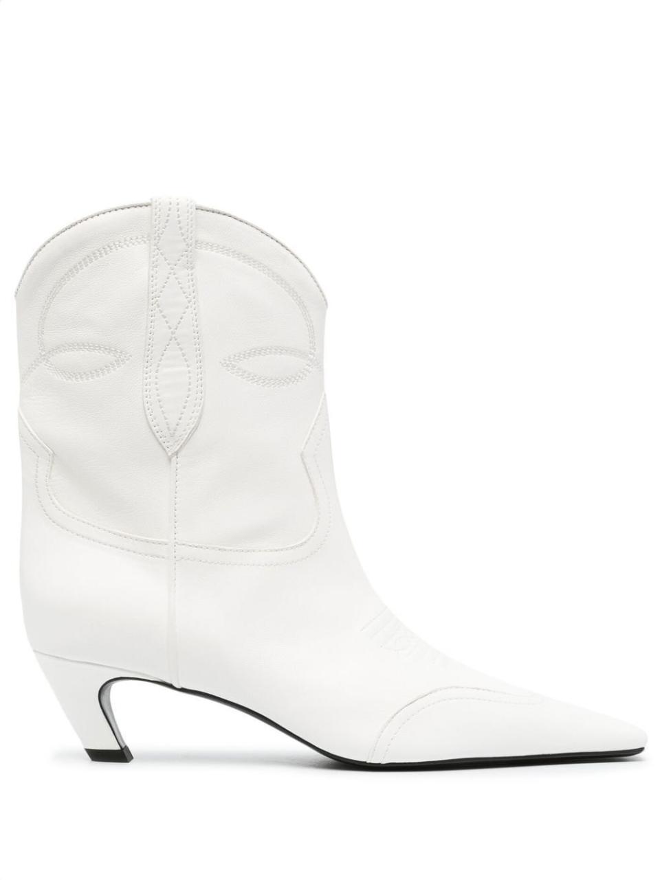 <p><strong>Khaite</strong></p><p>farfetch.com</p><p><strong>$990.00</strong></p><p>Certain fashion rules are meant to be broken sometimes. Case in point: these sleek, white ankle boots.</p>