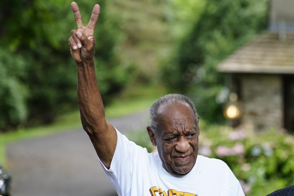 FILE - Bill Cosby gestures outside his home, June 30, 2021, in Elkins Park, Pa., after being released from prison. A group of women who accused Cosby of sexual assault and were dismayed when he had his conviction overturned and left prison are trying again to seek justice in the courts, by urging states to give them more time to pursue civil damages. (AP Photo/Matt Rourke, File)