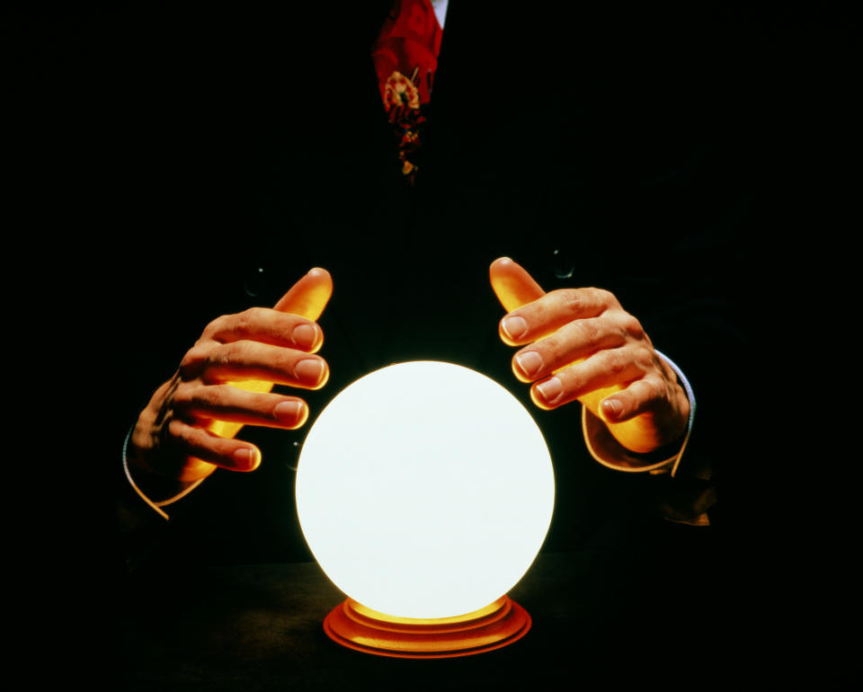 A psychic using a crystal ball