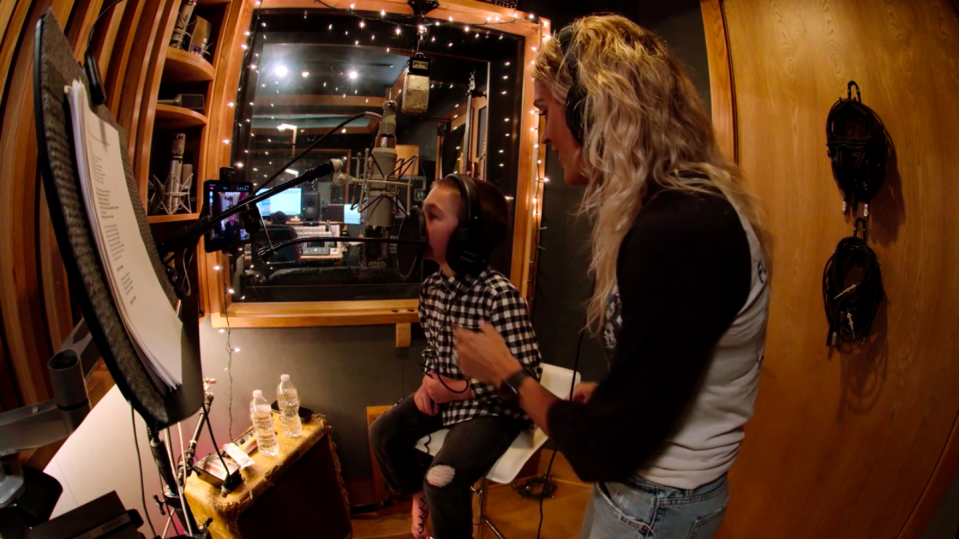 Carrie Underwood and her son recording "Little Drummer Boy"