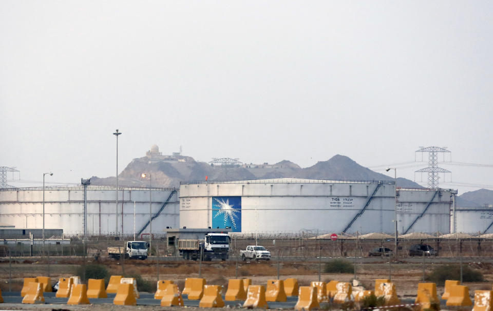 FILE - This Sept. 15, 2019, file photo, shows storage tanks at the North Jiddah bulk plant, an Aramco oil facility, in Jiddah, Saudi Arabia. Yemen's Houthi rebels said they struck a Saudi oil facility in the port city of Jiddah on Thursday, March 4, 2021, the latest in a series of cross-border attacks the group has claimed against the kingdom amid the grinding war in Yemen. A Houthi military spokesman, tweeted that the rebels fired a new Quds-2 cruise missile at the facility. He posted a satellite image online that matched Aramco’s North Jiddah Bulk Plant, where oil products are stored in tanks. (AP Photo/Amr Nabil, File)