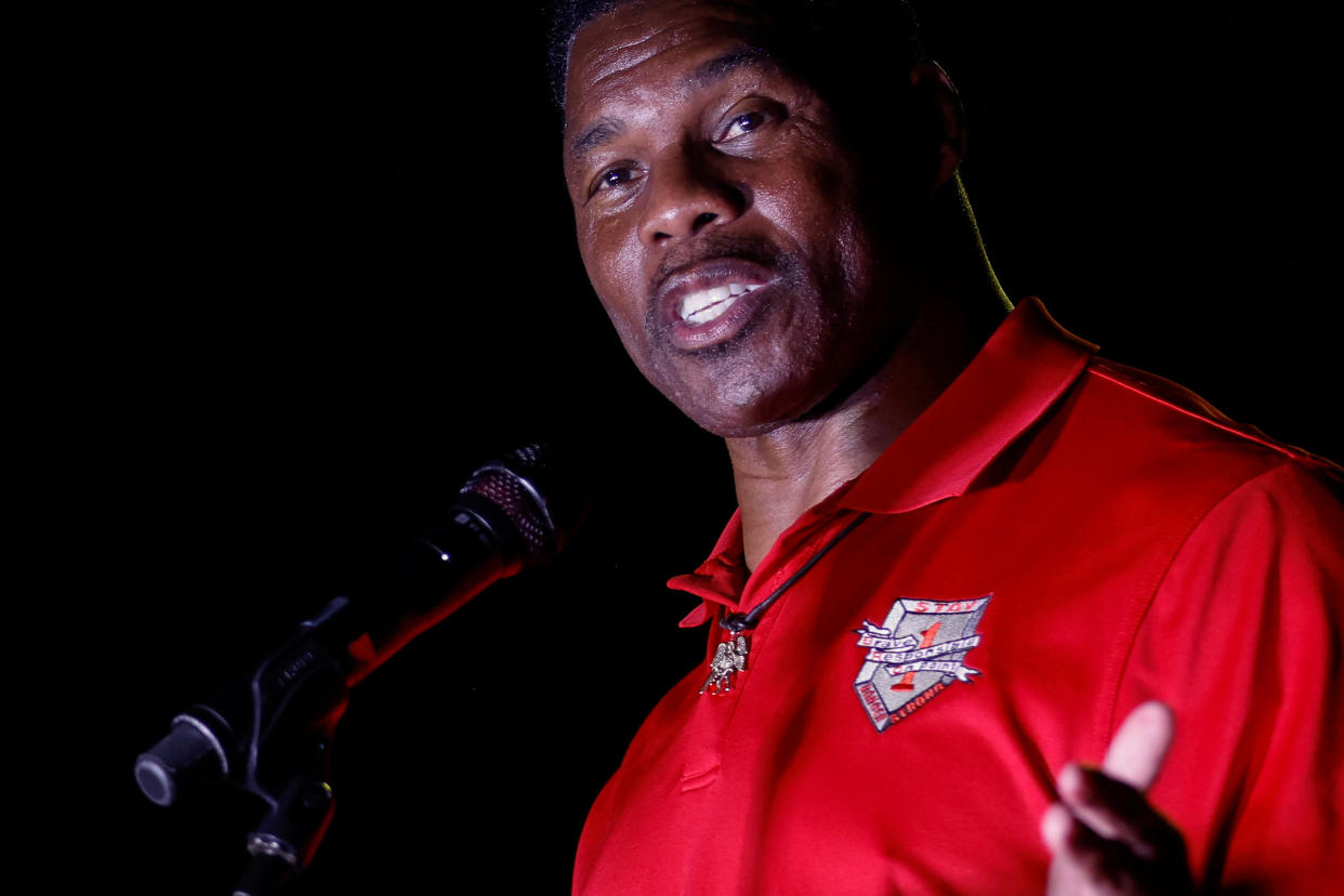 Herschel Walker, Georgia Republican candidate for the U.S. Senate, rallies with supporters at a campaign stop in Kennesaw, Ga.