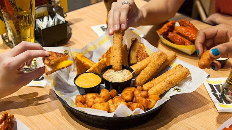 Group eating at Buffalo Wild Wings 