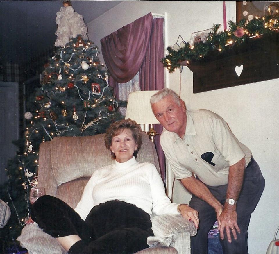 Esther and James "Wolfie" Wolfensberger pose for a Christmastime photo sometime in the early 2000s.