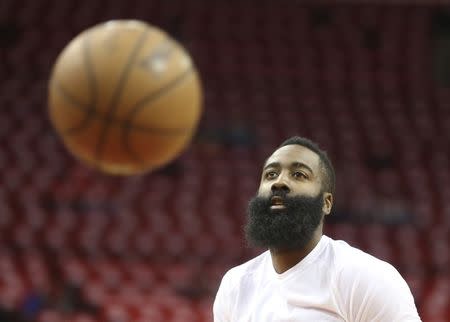 FILE PHOTO: May 10, 2019; Houston, TX, USA; Houston Rockets guard James Harden (13) warms up before playing against the Golden State Warriors before game six of the second round of the 2019 NBA Playoffs at Toyota Center. Mandatory Credit: Thomas B. Shea-USA TODAY Sports