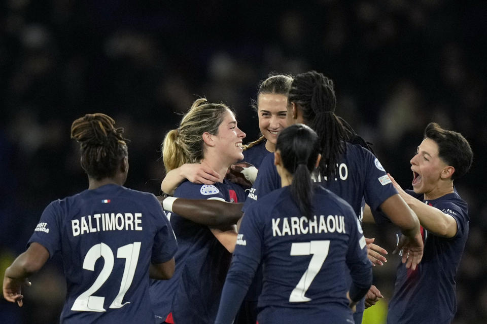 PSG's Korbin Albert, center left, celebrates after scoring her side's second goal during the women's Champions League quarterfinals, second leg, soccer match between Paris Saint-Germain and BK Hacken at Parc des Princes, in Paris, Thursday, March 28, 2024. (AP Photo/Thibault Camus)