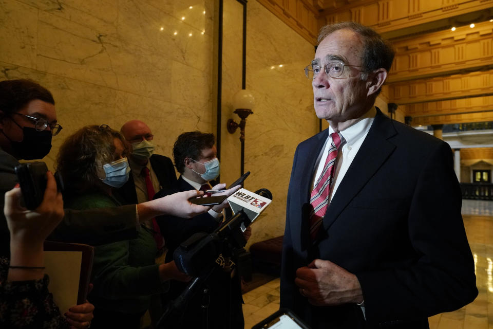 FILE - Mississippi Lt. Gov. Delbert Hosemann speaks to reporters regarding the purposed Tax Relief Act of 2022, following a meeting of the Senate Finance Committee at the Capitol in Jackson, Miss., Feb. 1, 2022. Hosemann supports a proposal to cut the state income tax, but not eliminate it altogether, and a reduction of the tax on groceries, provide a tax rebate up to $1,000 for 2022 and also the reduction of the cost of car tags. (AP Photo/Rogelio V. Solis, File)