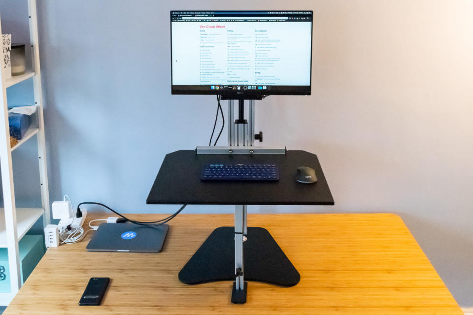 Standing desk converters