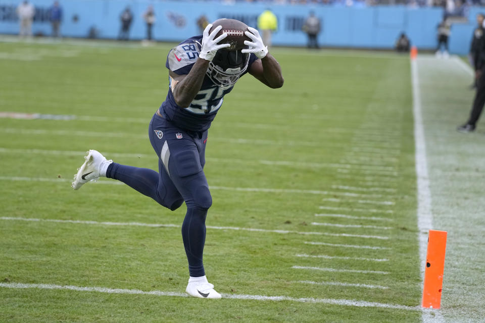 Tennessee Titans tight end Chigoziem Okonkwo catches a pass for a successful 2-point conversion during the second half of an NFL football game against the Jacksonville Jaguars Sunday, Dec. 11, 2022, in Nashville, Tenn. (AP Photo/Chris Carlson)