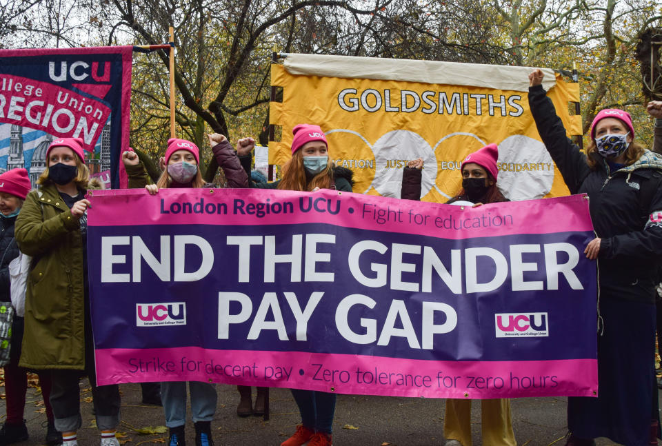 LONDON, UNITED KINGDOM - 2021/12/03: Protesters hold an 'End The Gender Pay Gap' banner during the demonstration in Bloomsbury.
University staff members of the University and College Union (UCU) have taken strike action and marched through Central London in protest over gender, ethnic and disability pay inequality, work conditions, and falling pay. (Photo by Vuk Valcic/SOPA Images/LightRocket via Getty Images)
