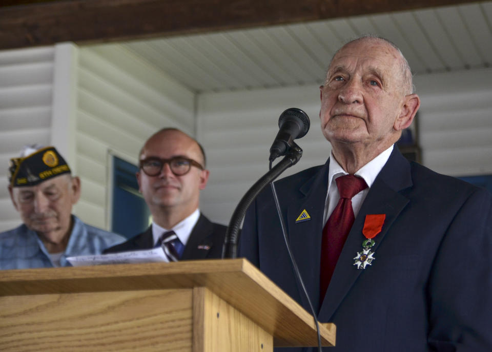 WWII veteran Jimmie H. Royer thanks everyone at the ceremony where Royer was awarded France's Legion of Honor at VFW Post 346 in Terre Haute, Ind., Sunday, Sept. 29, 2019. The 94-year-old World War II veteran from western Indiana received the medal Sunday for his wartime service. (Austen Leake/The Tribune-Star via AP)