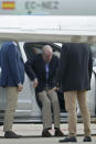 Spain's former King Juan Carlos gets into a car on arrival by private jet at the Peinador airport in Vigo, north western Spain, Thursday, May 19, 2022. Spain's former King has returned to Spain Thursday for his first visit since leaving nearly two years ago amid a cloud of financial scandals. (AP Photo/Lalo R. Villar)