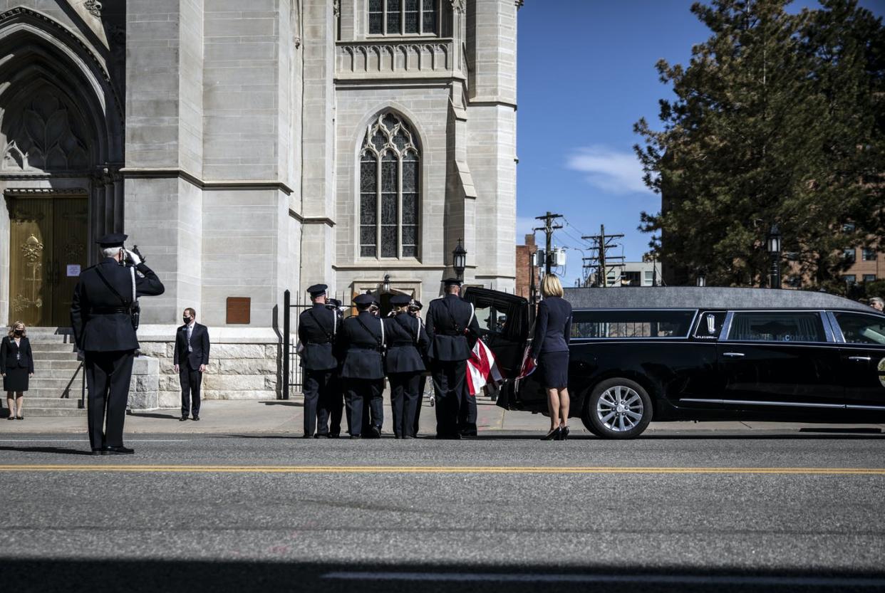 <span class="caption">The body of Boulder Police Officer Eric Talley, slain in the recent Boulder mass killing, is carried into a Funeral Mass on March 29, 2021 in Denver, Colorado. Chet Strange/Getty Images)</span> <span class="attribution"><a class="link " href="https://www.gettyimages.com/detail/news-photo/the-body-of-slain-boulder-police-officer-eric-talley-is-news-photo/1232006185?adppopup=true" rel="nofollow noopener" target="_blank" data-ylk="slk:Chet Strange/Getty Images;elm:context_link;itc:0;sec:content-canvas">Chet Strange/Getty Images</a></span>