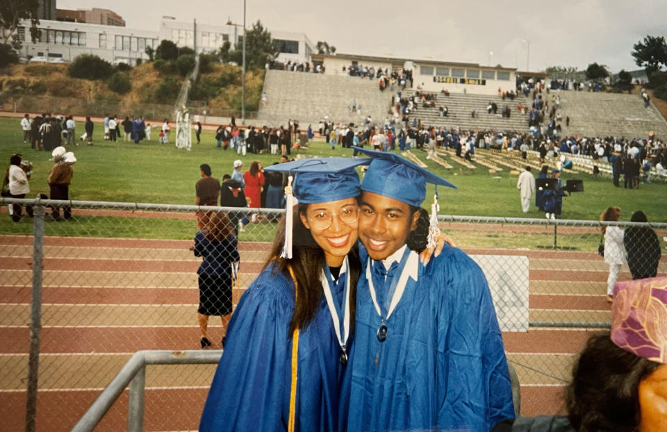 Nicole Childrers with friend Martin at high school graduation (Courtesy Nicole A. Childers)