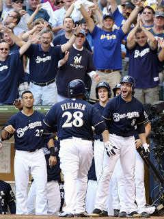 Fans at Miller Park react to Prince Fielder's two-run homer in the fifth inning of Game 1 of the NLCS against the Cardinals