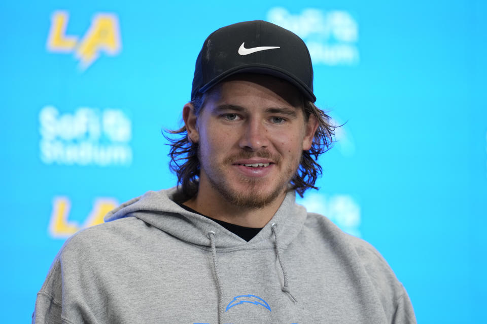 Los Angeles Chargers quartback Justin Herbert answers questions after an NFL football game against the Las Vegas Raiders Sunday, Oct. 1, 2023, in Inglewood, Calif. (AP Photo/Ashley Landis)