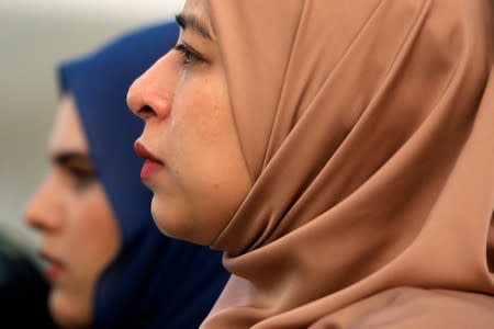 Family member reacts during a commemoration ceremony in memory of the victims of the Malaysia Airlines flight MH17 plane crash on the fifth anniversary of the accident, at the Australian High Commission in Kuala Lumpur