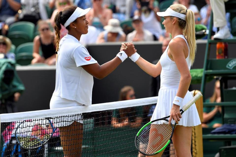 Naomi Osaka shakes hands with Katie Boulter after winning their 2018 Wimbledon second-round match 6-3, 6-4.