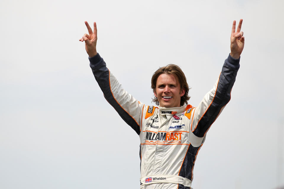 INDIANAPOLIS, IN - FILE: Dan Wheldon of England, driver of the #98 William Rast-Curb/Big Machine Dallara Honda, celebrates at the start/finish line after winning the IZOD IndyCar Series Indianapolis 500 Mile Race at Indianapolis Motor Speedway on May 29, 2011 in Indianapolis, Indiana. Wheldon died today, October 16, 2011 in Las Vegas, Nevada during the IZOD IndyCar World Championships when his car was involved in a 15-car wreck. (Photo by Nick Laham/Getty Images)