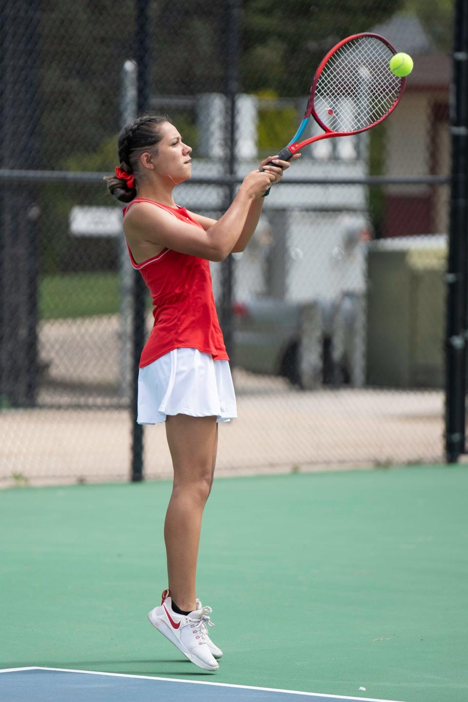 Pueblo Centennial's Ambrea Pena returns a serve in a No. 2 doubles match during the Class 4A Region 7 girls tennis tournament at the Pueblo City Park tennis courts on Saturday, May 7, 2022.