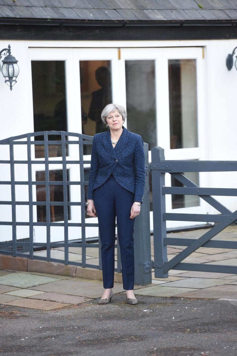 Theresa May waits for Emmanuel Macron outside the eatery in Maidenhead (Evening Standard / eyevine)