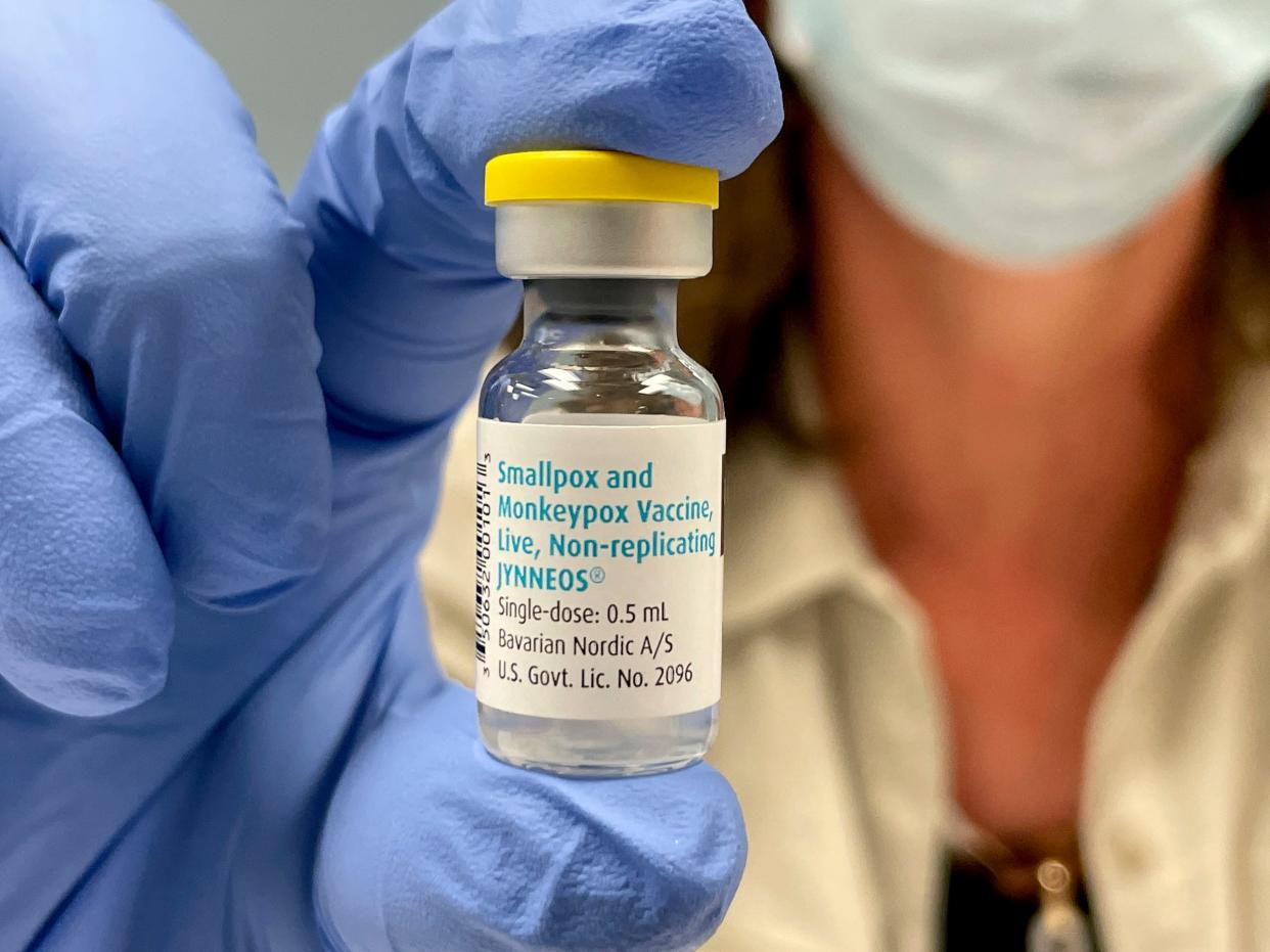 A nurse holds a vial of the monkeypox and smallpox vaccine.