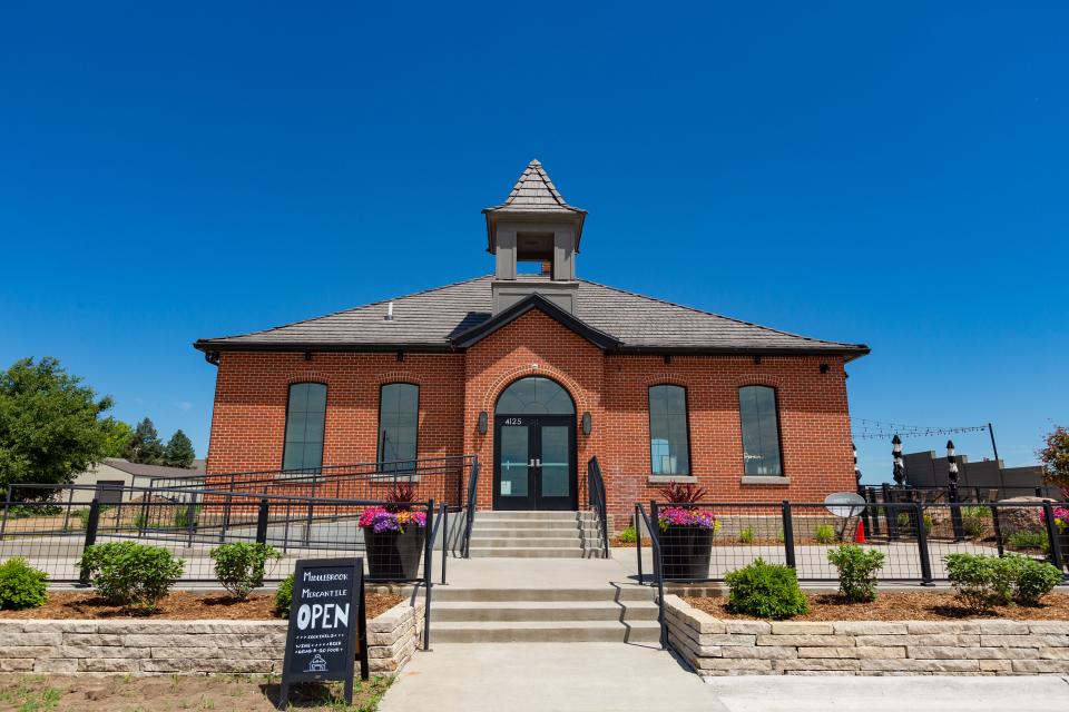 Middlebrook Mercantile features bar, event space, and a retail center in the Middlebook Agrihood community in Cumming.