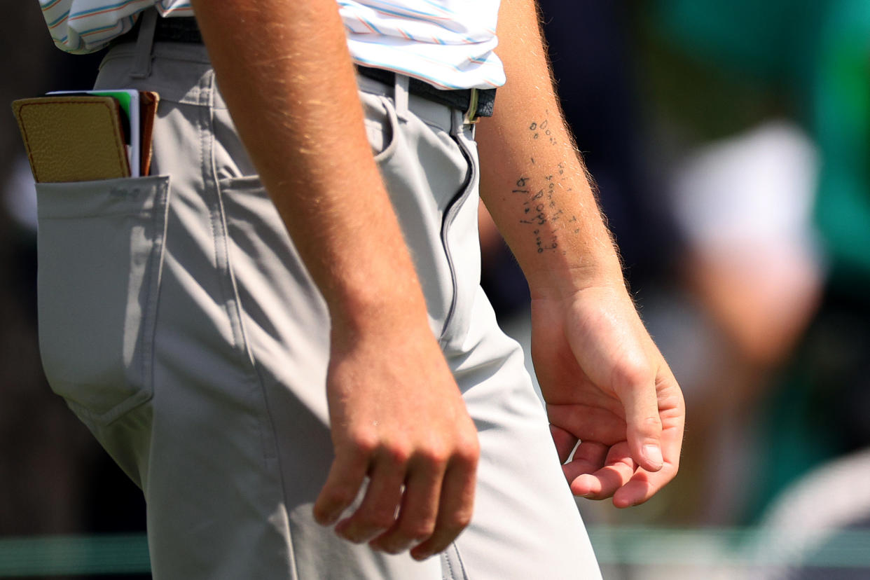 A tattoo on Sam Bennett's forearm during the Masters reads 