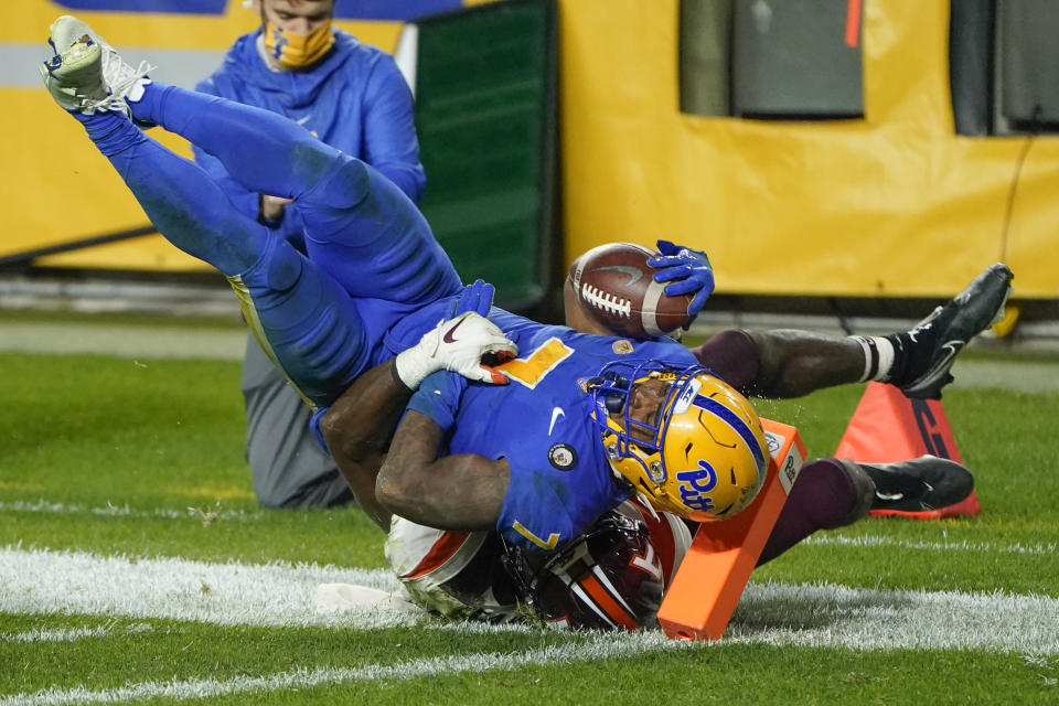 Pittsburgh wide receiver DJ Turner (7) comes up short of the end zone as he is tackled by Virginia Tech defensive back Divine Deablo (17) during the first half of an NCAA college football game, Saturday, Nov. 21, 2020, in Pittsburgh. (AP Photo/Keith Srakocic)