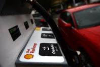 An electric car charge point is seen at the Holloway Road Shell station where Shell is launching its first fast electric vehicle charging station in London, Britain October 18, 2017. REUTERS/Mary Turner