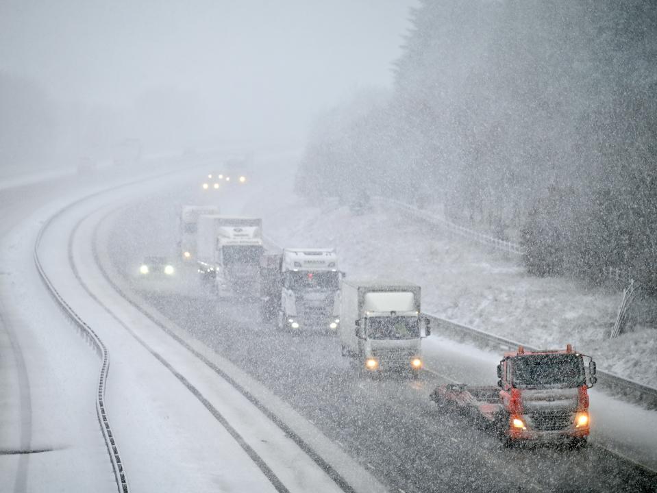 Vehicles make their way along the M74 between Abington and Beattock Summit in Scotland (Getty)