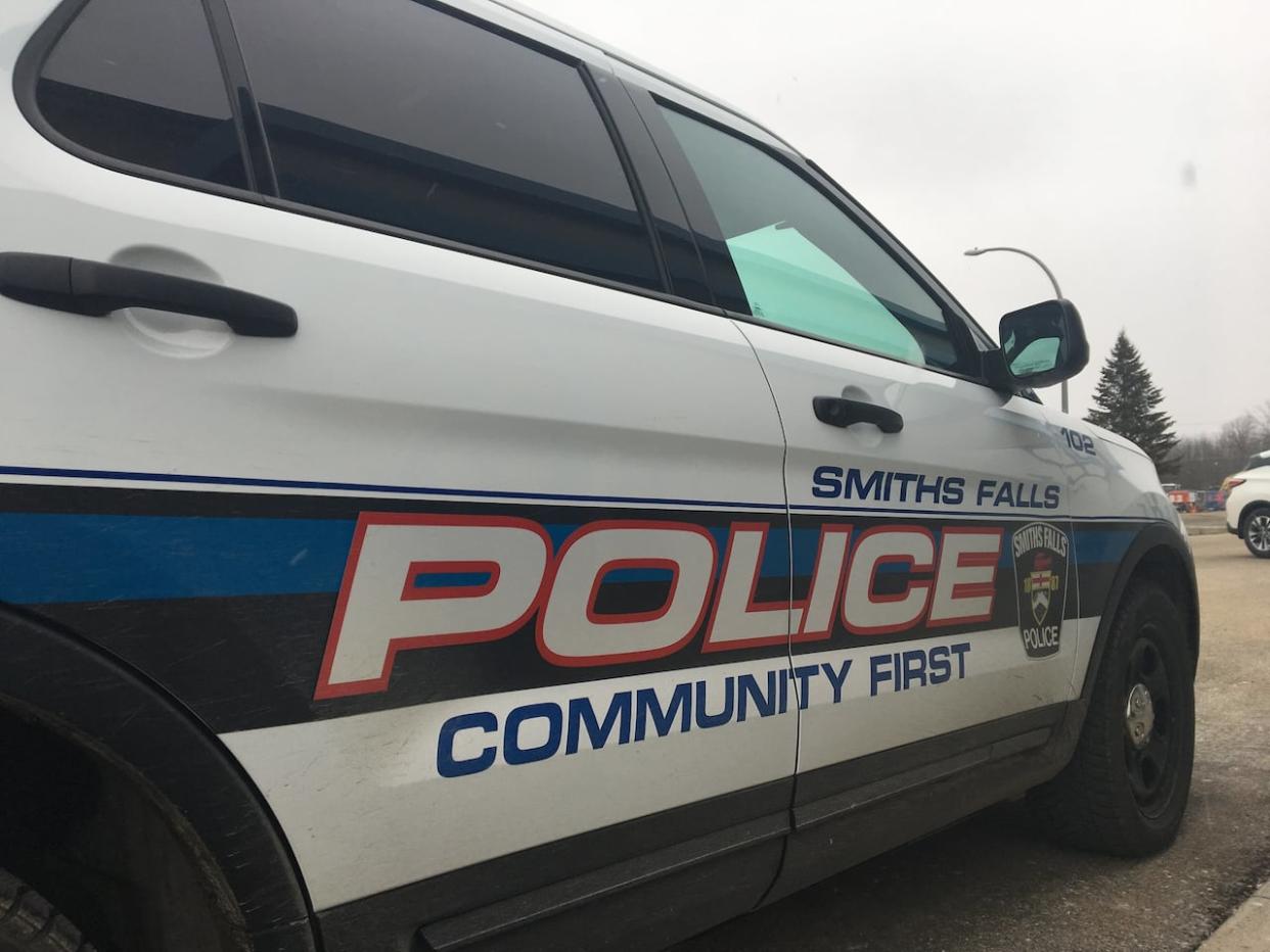 Police in Smiths Falls, Ont., told people around a central intersection south of the Rideau River to stay inside and lock their windows and doors for about two-and-a-half hours Thursday afternoon. (Matthew Kupfer/CBC - image credit)