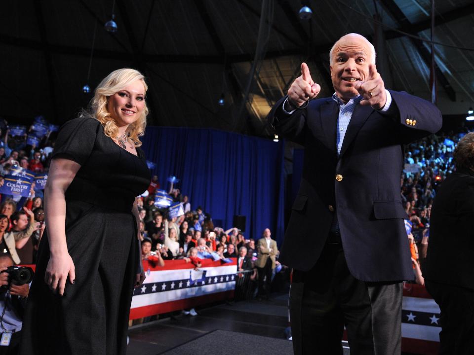 US Republican presidential candidate John McCain and his daughter Meghan McCain (L) attend a campaign rally at Otterbein College in Westerville, Ohio on October 19, 2008.