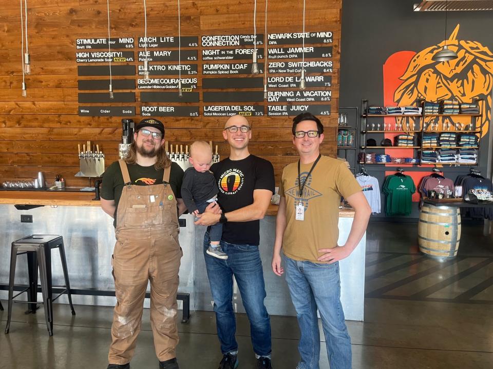 From left, head brewer Justin Colatrella, and founder-partners Jimmy and Dan Vennard, stand at Autumn Arch Beer project in Glasgow, Delaware, in Oct. 2023, with a presumed future brewer.