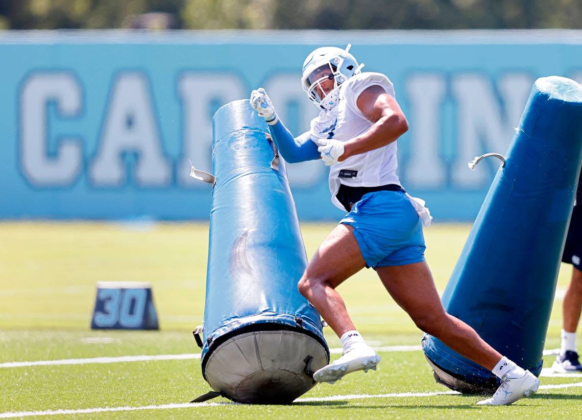 North Carolina linebacker Noah Taylor runs a drill during UNC’s first football practice of the season on Friday, July 29, 2022, in Chapel Hill, N.C.