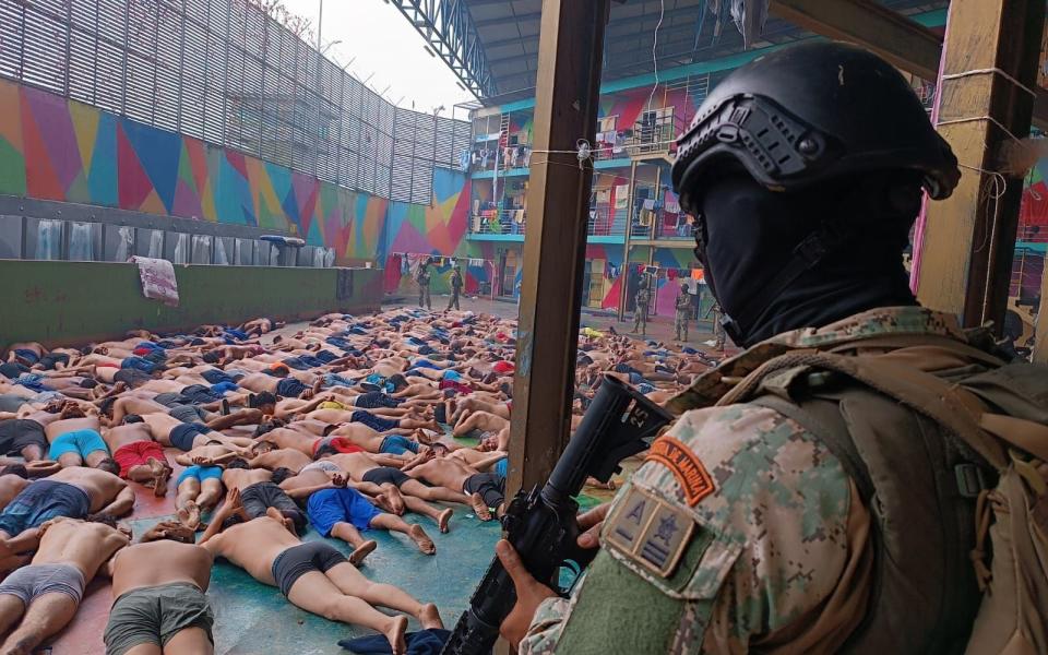 Marine Infantry soldiers attend after a riot at the Litoral Regional Prison in Guayaquil on Jan 8