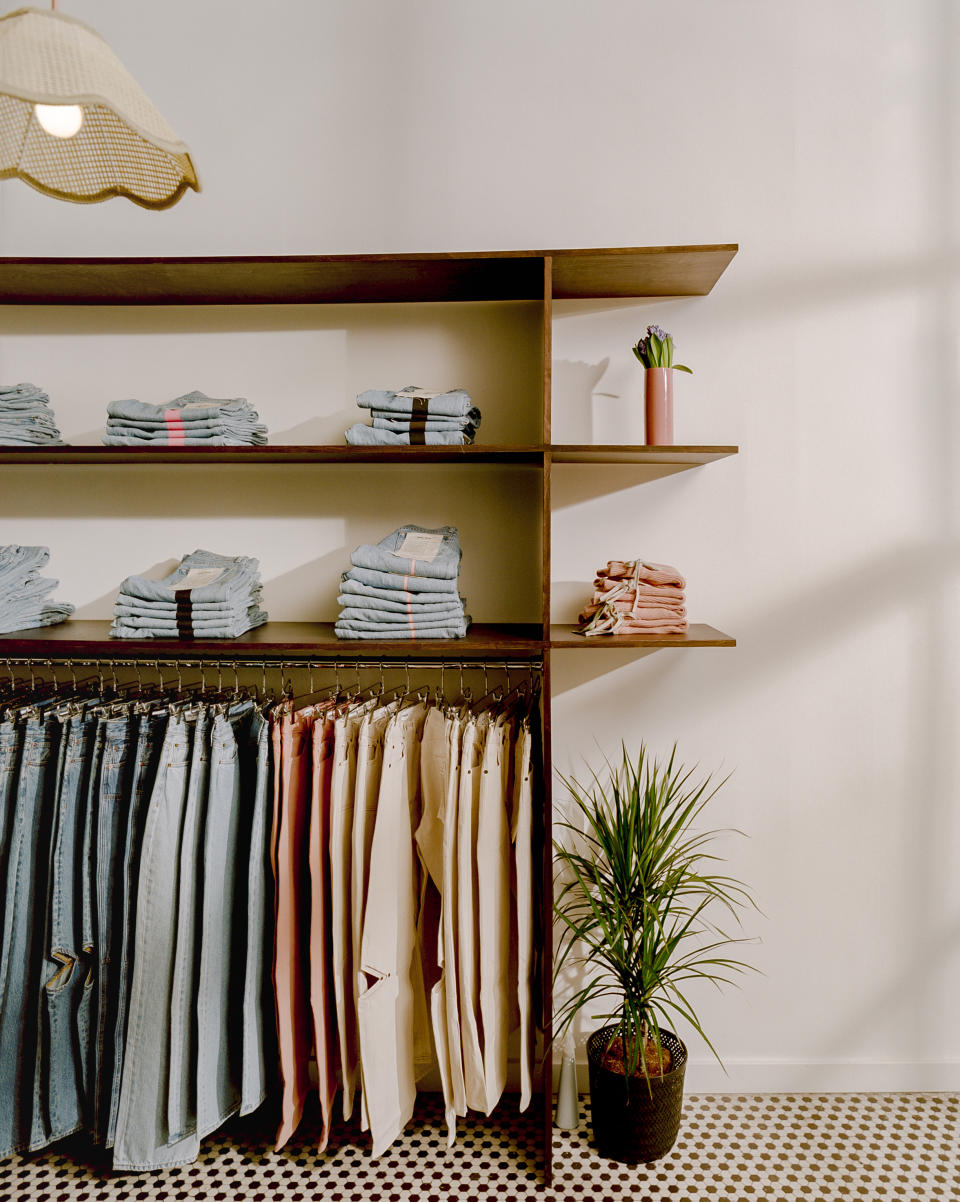 The shop offers a selection of denim styles and complementary products.