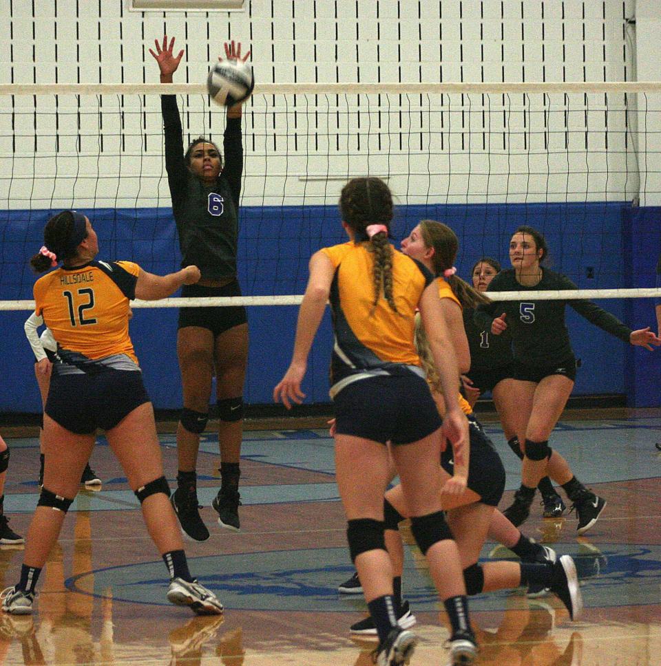 Northwestern High School's Arianna Firebaugh (6) plays defense during volleyball action against Hillsdale High School at Northwestern High School Tuesday, Oct. 6, 2020.